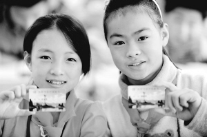 沈阳：农民工子女有了医保卡