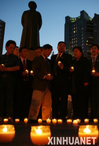 全球华人赈灾总动员：有中国人地方 就有对同胞牵挂