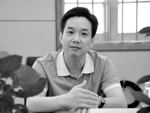 传承经典 追求卓越——记湖北省中医院院长邓小川