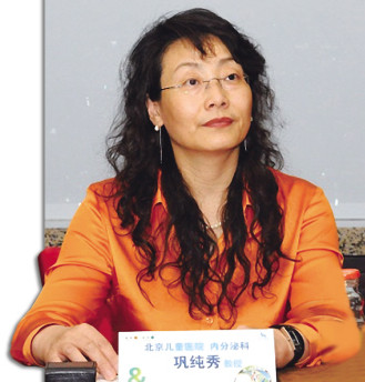 巩纯秀：儿科专家练“心术”