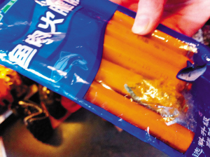 哈尔滨家乐福售金锣问题肠 赔偿方案遭顾客拒绝