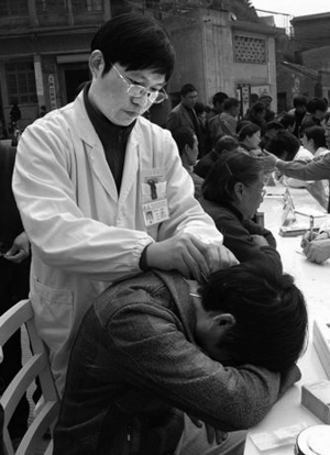 为人辛苦为人忙--记浙江省劳模、台州市立医院针推科主任郎伯旭