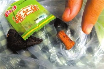佳宝牌酱芒果现烟蒂 购买者被许诺赔偿500元