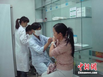 秋季流感来势汹汹 昆明市民“忙”于接种疫苗