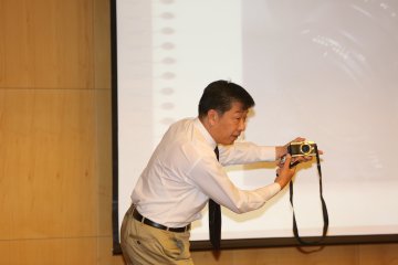 中心举办摄影技巧培训班