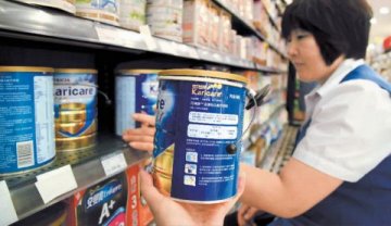 奶粉进药店：企业很纠结降价有点远