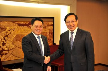 毕井泉会见联合国工业发展组织李勇总干事