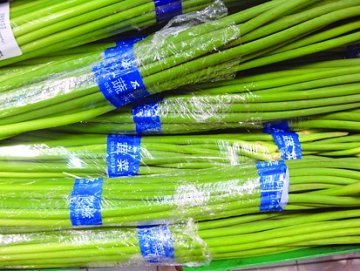 质检部门称超市绑蔬菜彩胶带对人体有害