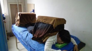 背起灸箱治虚寒症