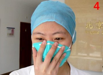 北京疾控中心：如何正确穿戴防护服