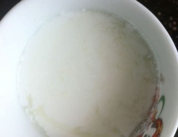 光明致优牛奶加热呈豆腐花状 客服只赔偿不解释