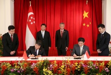 国家发展改革委与新加坡共和国国家发展部签署城市治理规划管理领域合作备忙碌