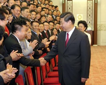 习近平会见全国援外医疗工作先进代表