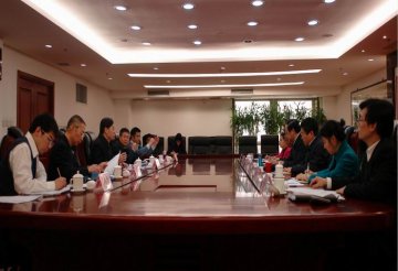 王国强副主任与商务部副部长房爱卿举行工作会谈