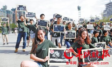 广州：残障人士也玩快闪 街头倡导环保理念
