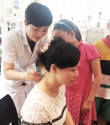 银针入校园，助教师健康