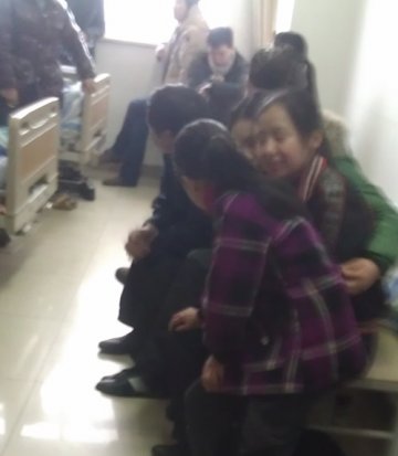“草莓脸”何付荣 因养女而坚强