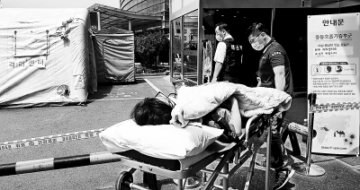 韩国一名MERS疑似患者死亡 确诊病例增至18人