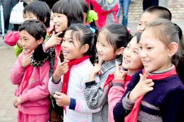 “春苗营养计划”回访小学生营养餐的落实