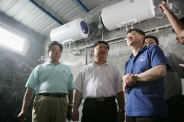 陈竺部长对京安小区卫生防病综合示范点给予高度评价